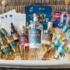 A hamper full of gin and associated products.
